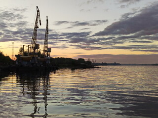 Fototapeta na wymiar Port evening on the Volga River