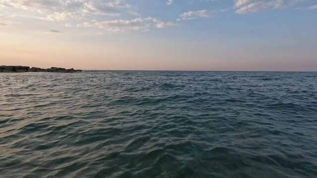 Inside the sea during the sunset. foce sea in Rocca San Giovanni, Italy. 