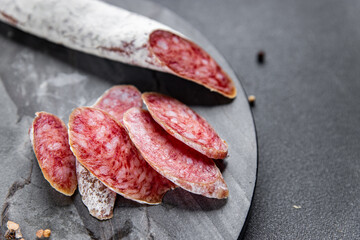 Fuet sausage cured spanish meat product meal food snack on the table copy space food background rustic top view