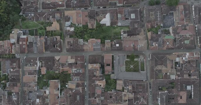 Drone view of colonial houses and streets of the town of Jerico, Antioquia, colombia - Shot in D-Log