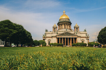 Panoramic view on Saint Isaac's Cathedral. Isaakievskiy Sobor with green lawn in summer, St. Petersburg, Russia. High quality photo
