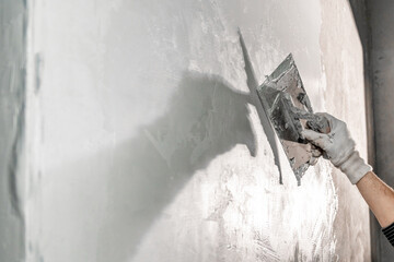 application of insulation to the wall against moisture and water