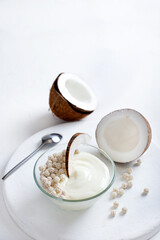 Coconut yogurt on white background