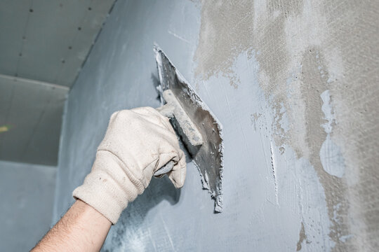 application of insulation to the wall against moisture and water