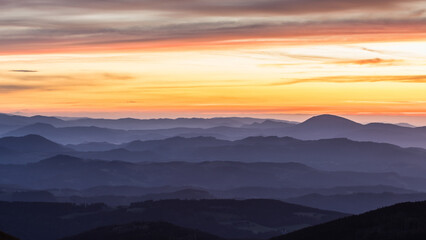 Fototapeta na wymiar Mountain layers with a dramatic sky before sunrise