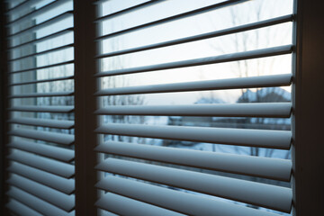 close up of an open window with shutters