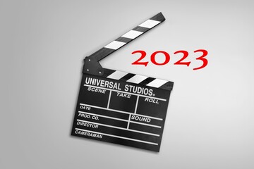 Naklejka premium Classic film slate or clapboard on background