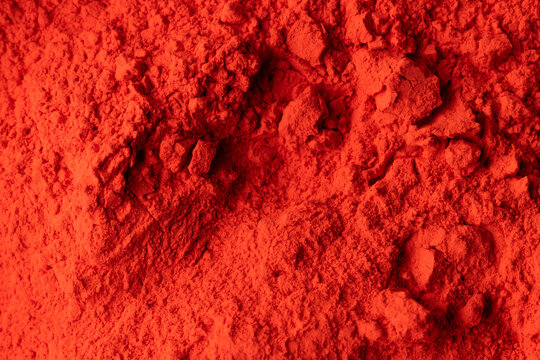 Close up of red powder background, with copy space