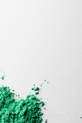 Close up of green powder with copy space on white background