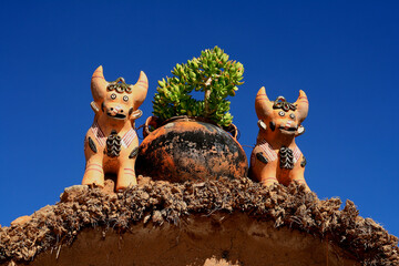 Pucará bulls in houses of Puno, Peru