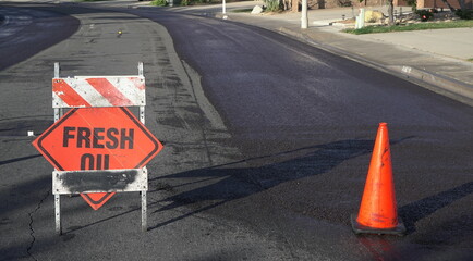A residential road is closed off during road resurfacing project  