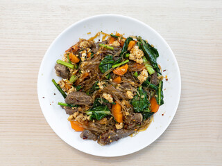 A plate of fried glass noodle.