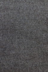 Woolen fabric, in shades of brown, taken from a wool blazer.