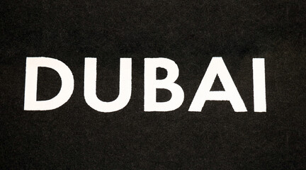 Fototapeta na wymiar Dubai text on textile