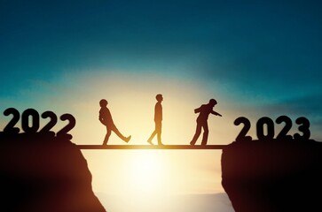 New year of 2023. Walking people on rock