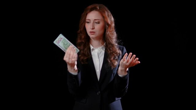 (Camera: ARRI ALEXA, 35mm lens, real time) A caucasian businesswoman has money taken away from her. For more variations of this clip, check out this seller's other videos.