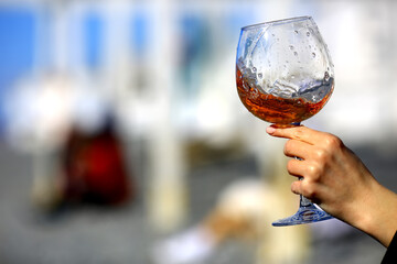 a glass of port wine in hand, portugal drink alcohol