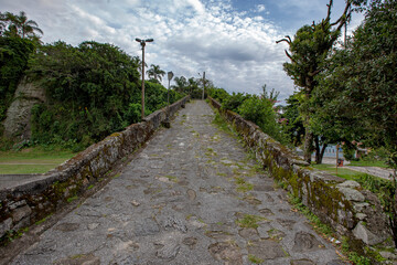 Stone path in historical city of Itanhaem, coast of state of Sao Paulo, Brazil