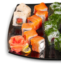 Maki-sushi on black plate