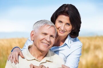 Fototapeta premium Mature old couple looking happy outdoors at farm,