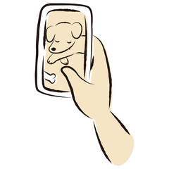 愛犬の様子（画像）が表示されたスマートフォンを持つ手