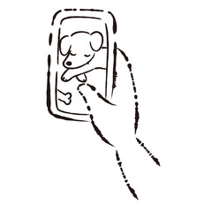 愛犬の様子（画像）が表示されたスマートフォンを持つ手