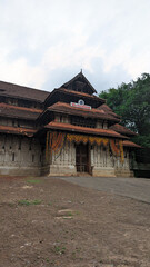 entrance of a historical temple of worship for hindus in kerala in the daytime