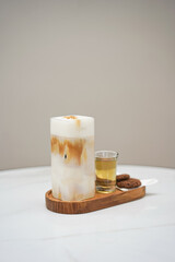 Iced Coffee with Sugar in a Table