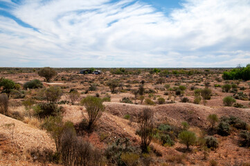 White Cliffs Australia, view across opal mine fields to horizon with cloudy sky