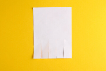 White mockup of white wall ad with space for phone numbers on yellow background