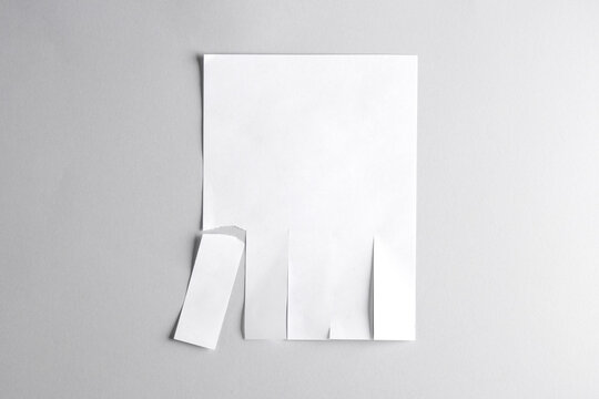 White mockup of white wall ad with space for phone numbers on gray background