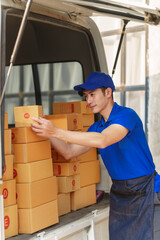 Delivery man asia people checking portable delivery device with parcel box to customer home address.