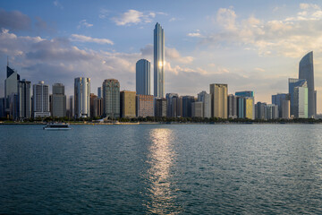 Naklejka premium Abu Dhabi's skyline before sunset.