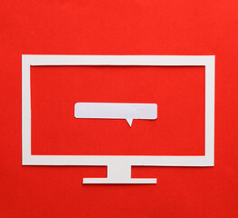 Paper cut tv with speech bubble on red background