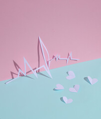 Paper-cut heart rhythm cardiogram with hearts on pink blue pastel background. Creative layout. Love...