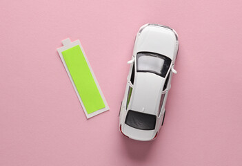 Electro car. Car and battery with a full charge level on a pink background