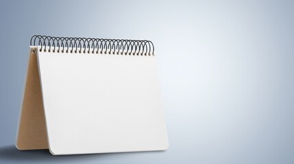 Empty blank office calendar or notebook on desk