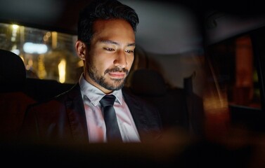 Travel, night and business man in car relaxing, commuting and traveling after working. Transport, road and young male professional, passenger or businessman sitting in vehicle, motor or taxi in city.