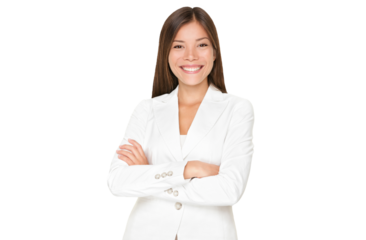 Confident smiling young Asian businesswoman in a stylish white suit standing with her arms folded isolated cutout PNG on transparent background.