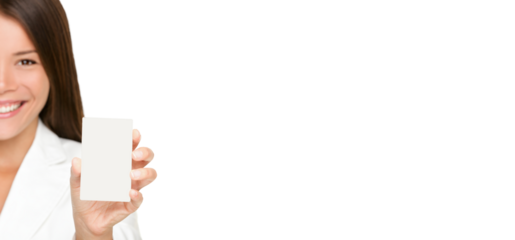 Woman showing business card. Businesswoman in suit holding blank card sign. Can be replaced with smart phone. Asian / Caucasian business woman isolated cutout PNG on transparent background in suit.