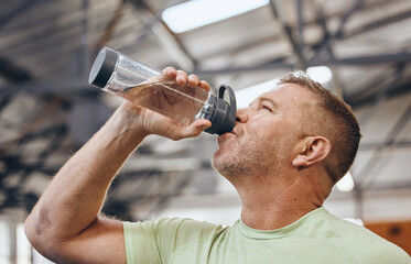 Man, fitness and drinking water bottle for detox after workout, exercise or cardio training...