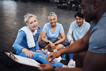Senior woman, talking and personal trainer contract with elderly friends ready for wellness. Sports checklist, gym document and workout group with happiness in a training gym floor for fitness