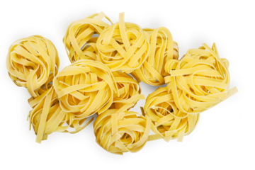 Close-up of raw yellow pasta isolated on white background