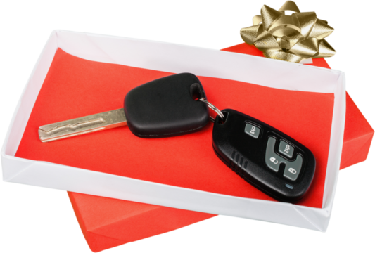 Car key with red gift box isolated on white background