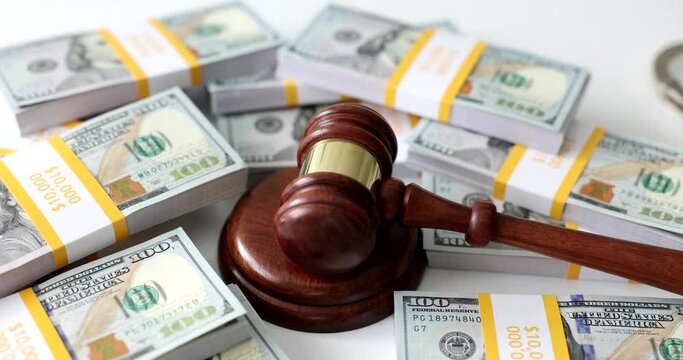 Judicial gavel on dollar money and financial crimes