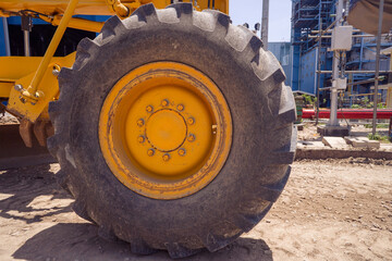 Fototapeta premium Land scraper and Vibro roller the heavy equipment for pretreatment road construction. photo is suitable to use for industry background photography, power plant poster and electricity content media.