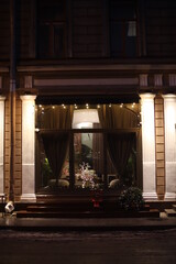 Evening lights of the ancient city. Beautiful houses and streets.