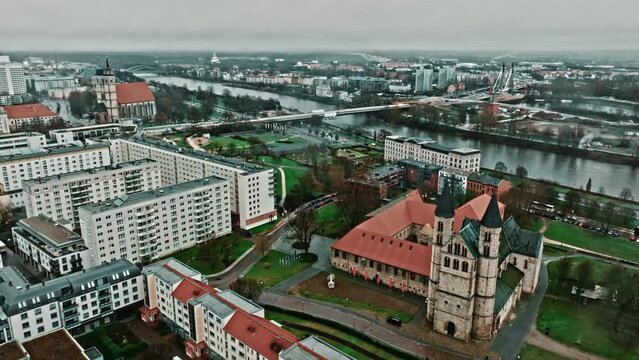 Drone shot revealing Kloster church (Klosterkirche) near Kunstmuseum Magdeburg - Kloster Unser Lieben Frauen (Kunstmuseum Magdeburg - Monastery Of Our Lady) , Magdeburg, Germany