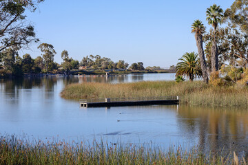 View of one of the fishing floats on the lake at Miramar reservoir in San Diego, California. © Romar66