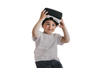 Little cheerful boy smiling wide taking off vr glasses, amazed after using virtual reality googles...
